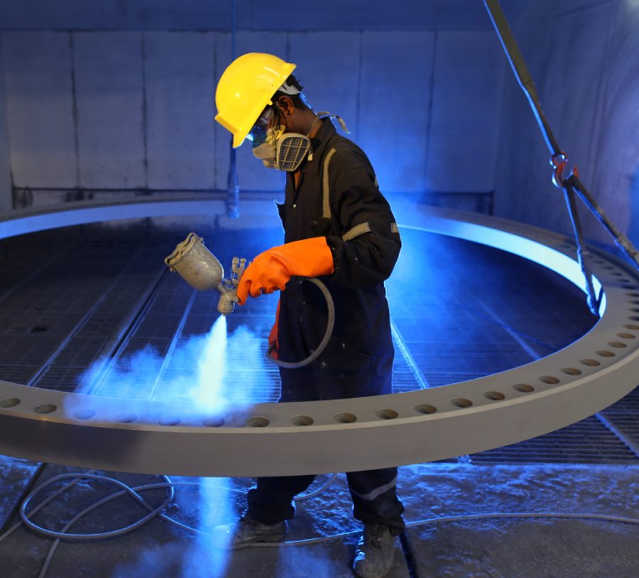 SEForge employee working with protective equipment